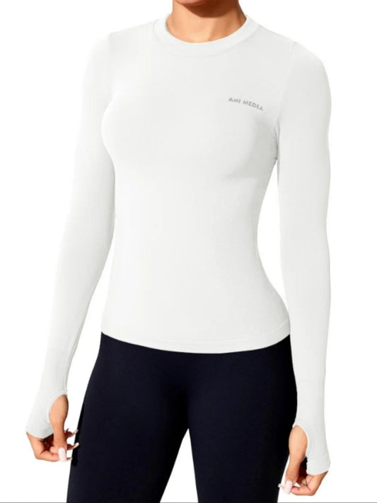 Elevate your fitness wardrobe with our Long Sleeve Yoga Shirt, crafted from breathable, quick-dry nylon for ultimate comfort during workouts. This seamless design hugs your body perfectly, allowing for unrestricted movement. Ideal for the gym, running, or casual outings,